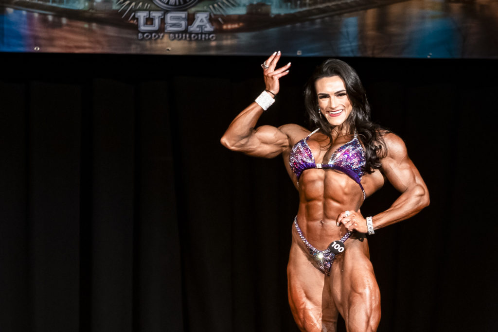 Women's Physique competitor Natalia Coelho at the 2022 NPC/IFBB Pittsburgh Pro finals