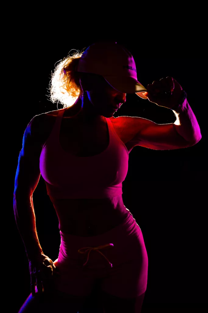 Athlete in the studio with colored gels